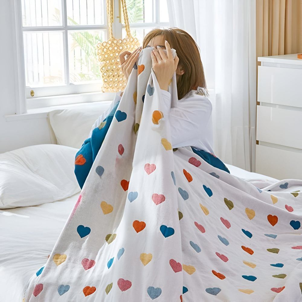 Whimsical Hearts Reversible Cotton Blanket — lifestyle shot