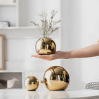 Opulent Golden Ball Vase Collection — product in use