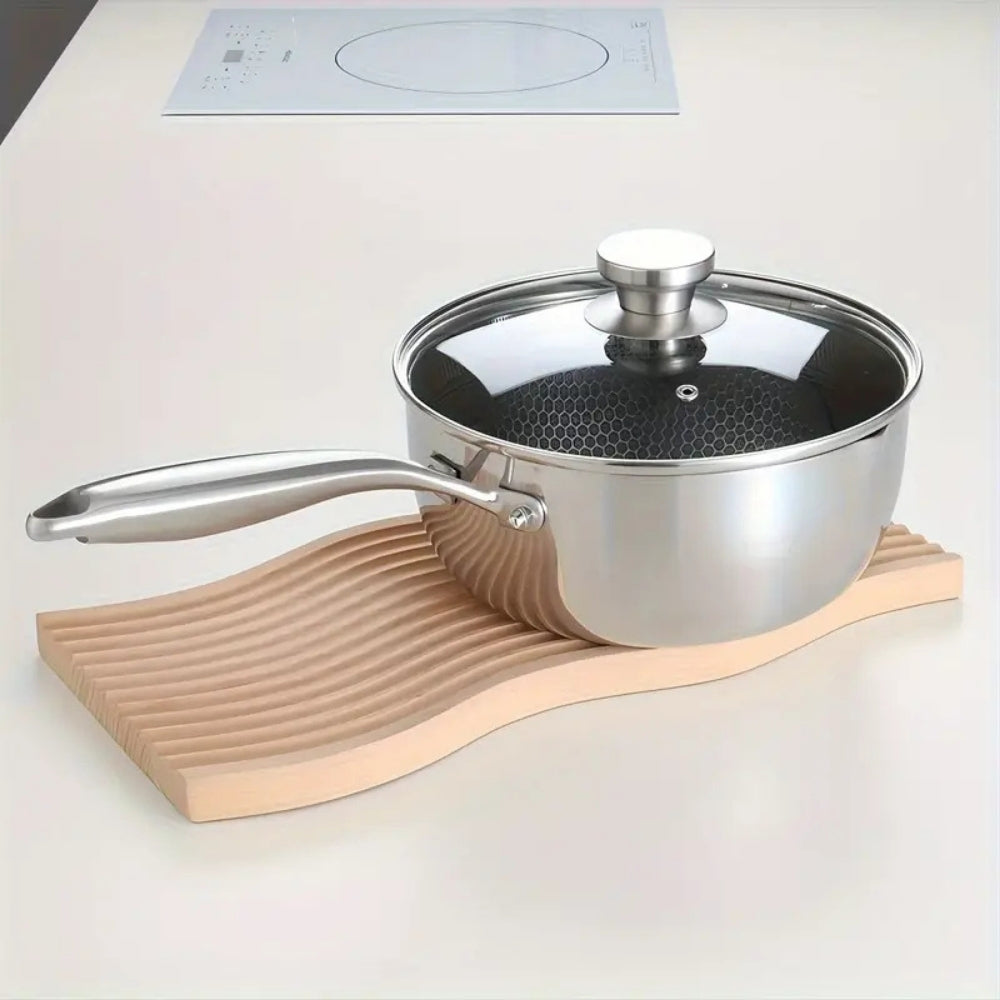 Modern Stainless Steel Saucepan with Glass Lid — material texture close-up