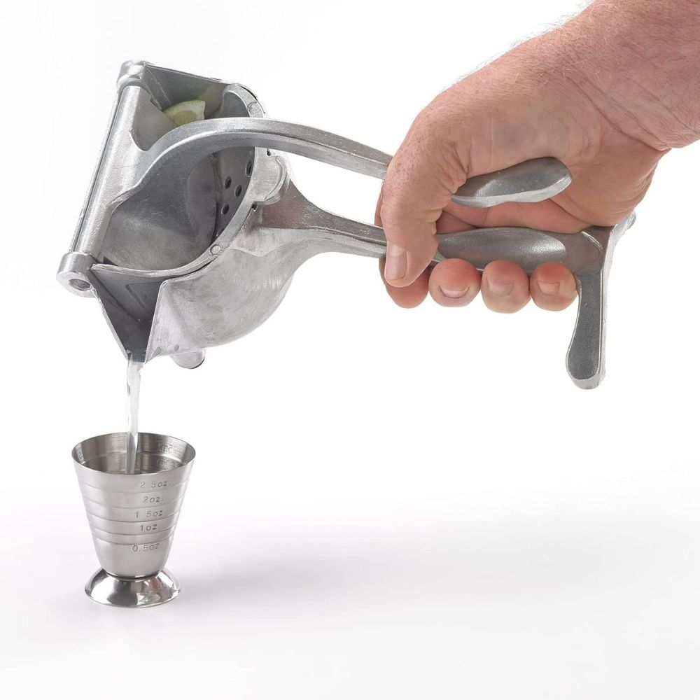 Nova Press Citrus Juicer — product in use