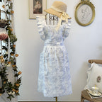 Ruffled Ink Floral Apron — product in use