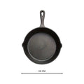 Black Cast Iron Frying Pan — material texture close-up