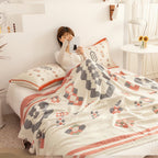 Chevron Design Four-Layer Cotton Blanket — product in use