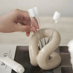 Nordic Knot Ceramic Holder — product in use