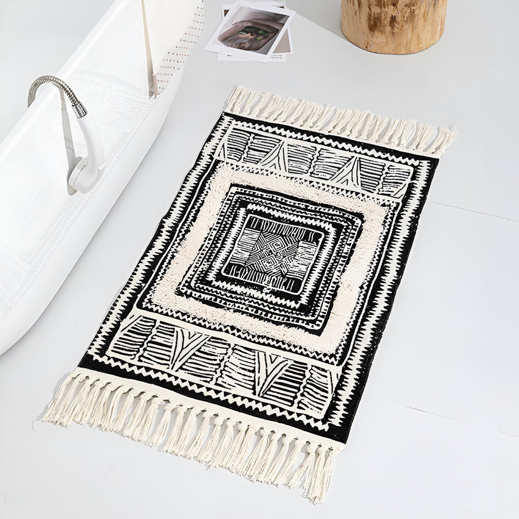 Black and White Geometric Tassel Floor Mat — product in use