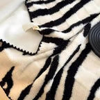 Zebra Print Luxe Faux Fur Blanket — lifestyle shot