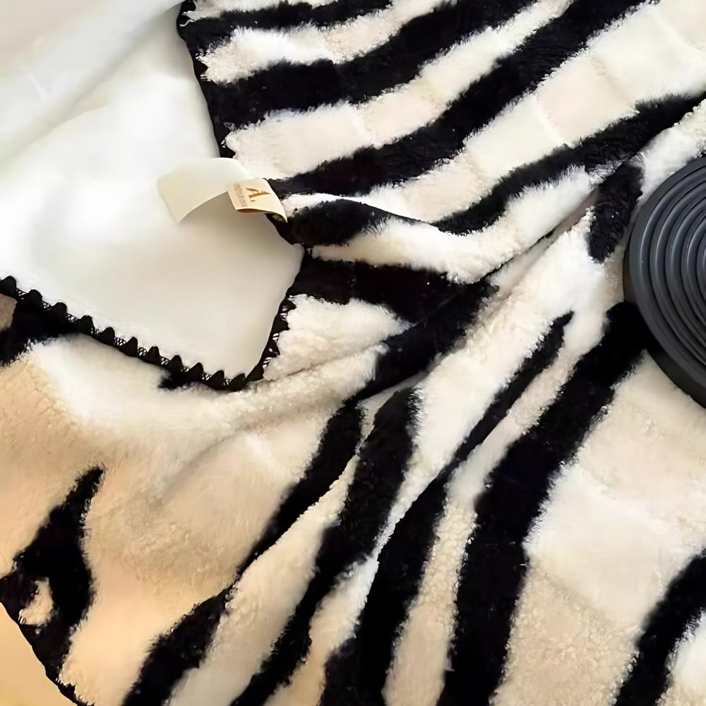Zebra Print Luxe Faux Fur Blanket — lifestyle shot