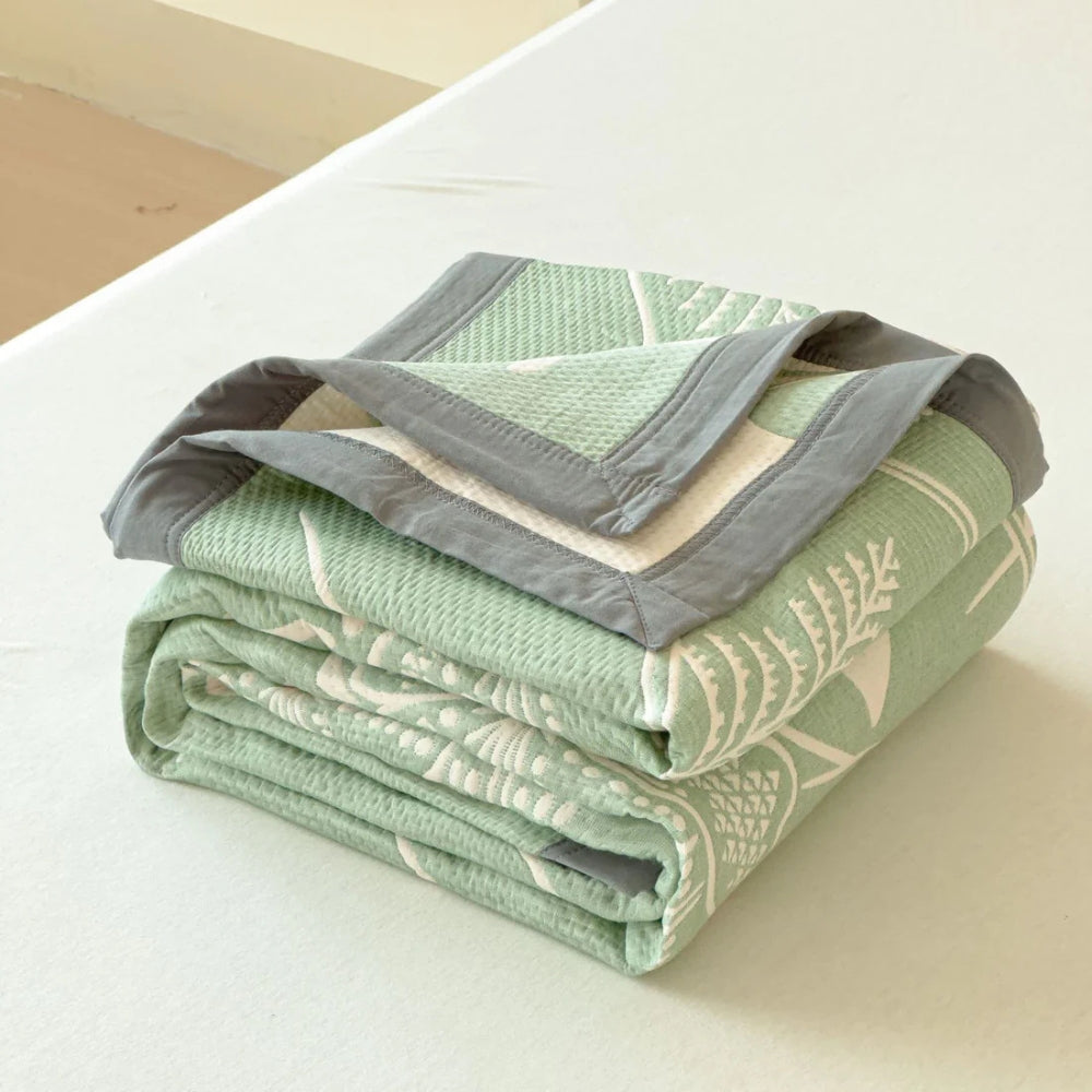 Aurea Reversible Cotton Gauze Blanket — product in use