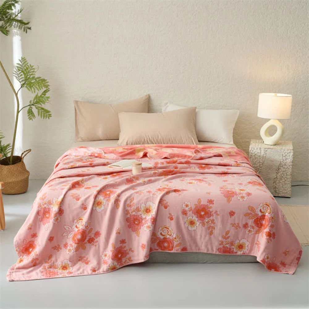 Blush Cotton Gauze Floral Blanket — product in use