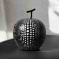 Luxurious Polka Dot Apple Sculpture — material texture close-up