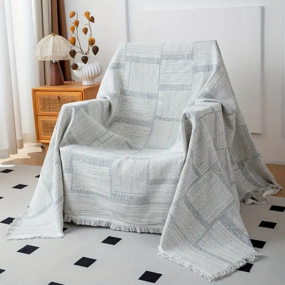 Mixed Tone Geometric Cotton Blanket — product in use