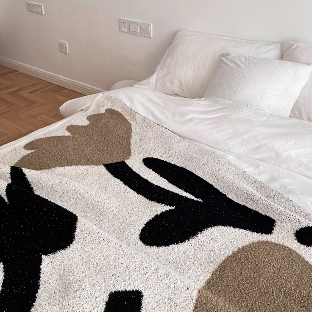 Onyx Cosy All-Season Travel Bed Blanket — product close-up
