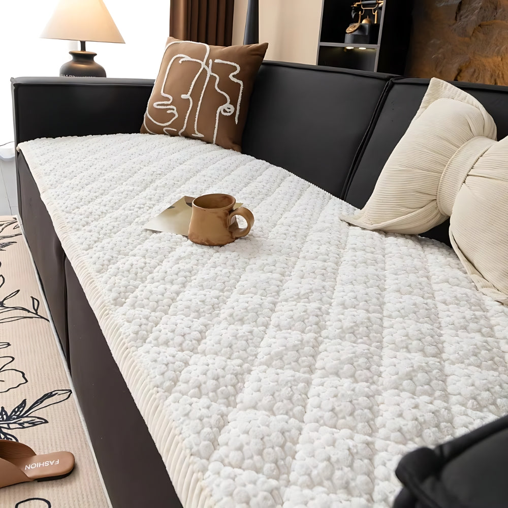 Pet-Proof Textured Quilted Sofa Protector Slipcover — product in use