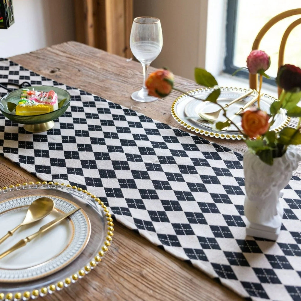 Tasseled Diamond Checkered Table Runner — lifestyle shot