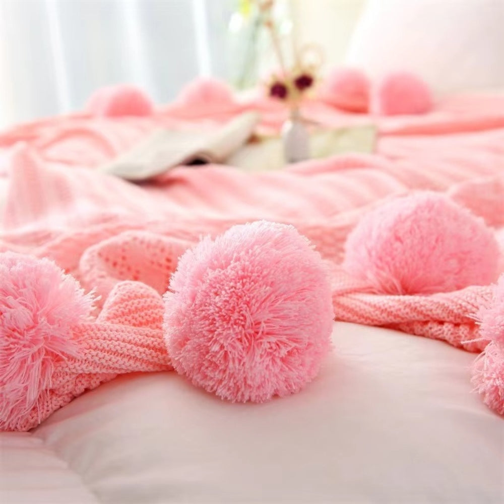 Whimsy Fluffy Pom-Pom Macaron Blanket — product in use