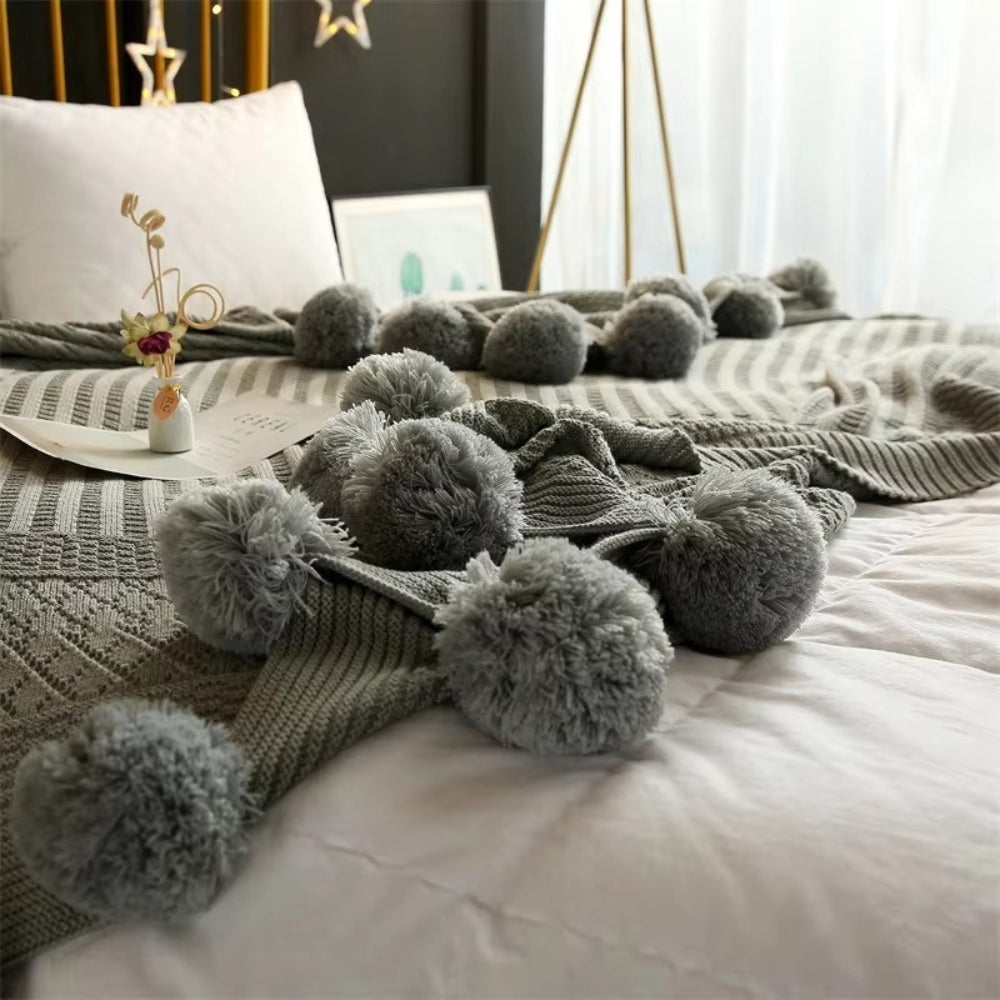 Whimsy Fluffy Pom-Pom Macaron Blanket — product close-up